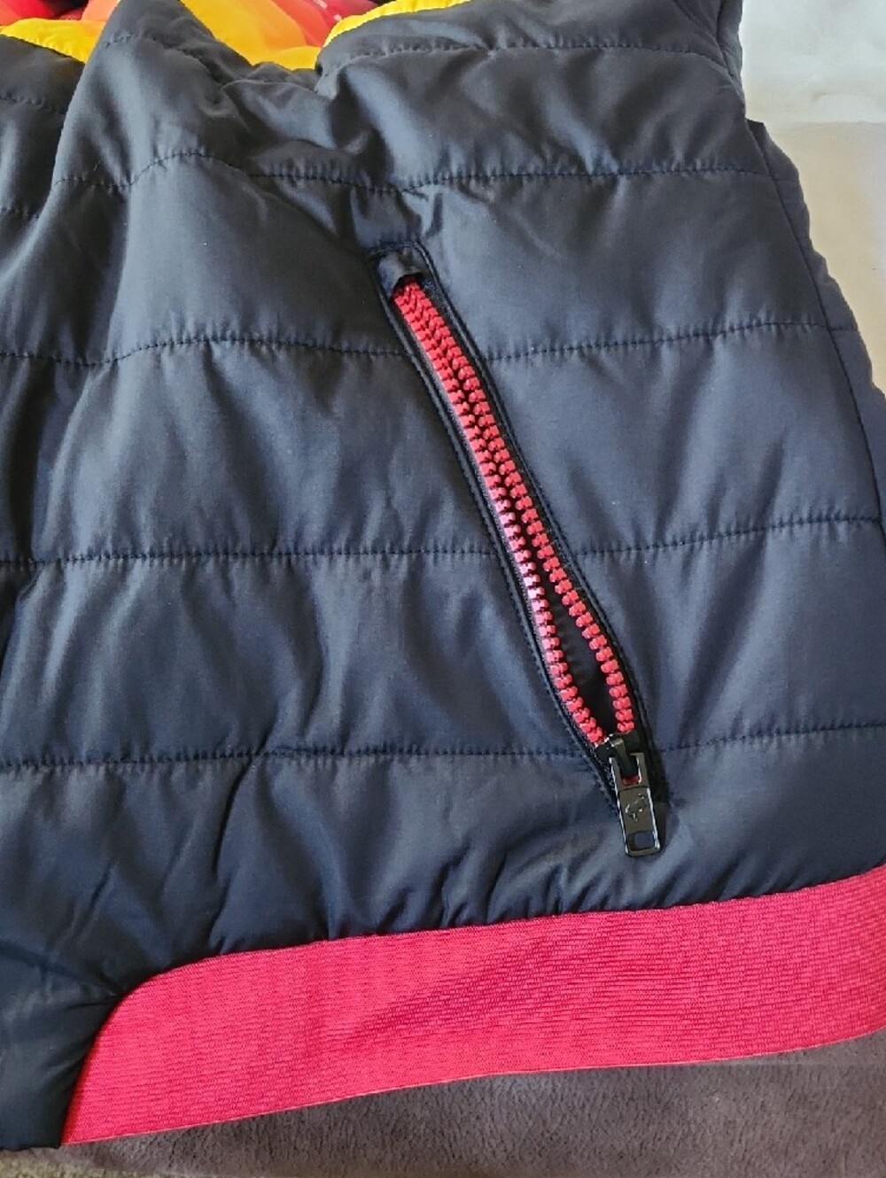 Official Ford Black Puffer Vest with Red, Orange & Yellow Stripes - Picture 6 of 8